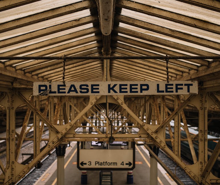 Railway station platform indicating direction of travel